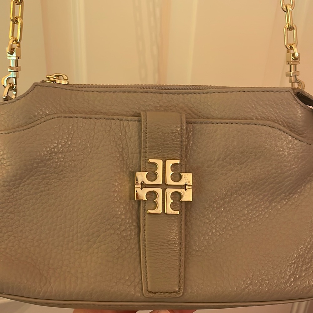 Tory Burch gray and gold cross body bag with pockets